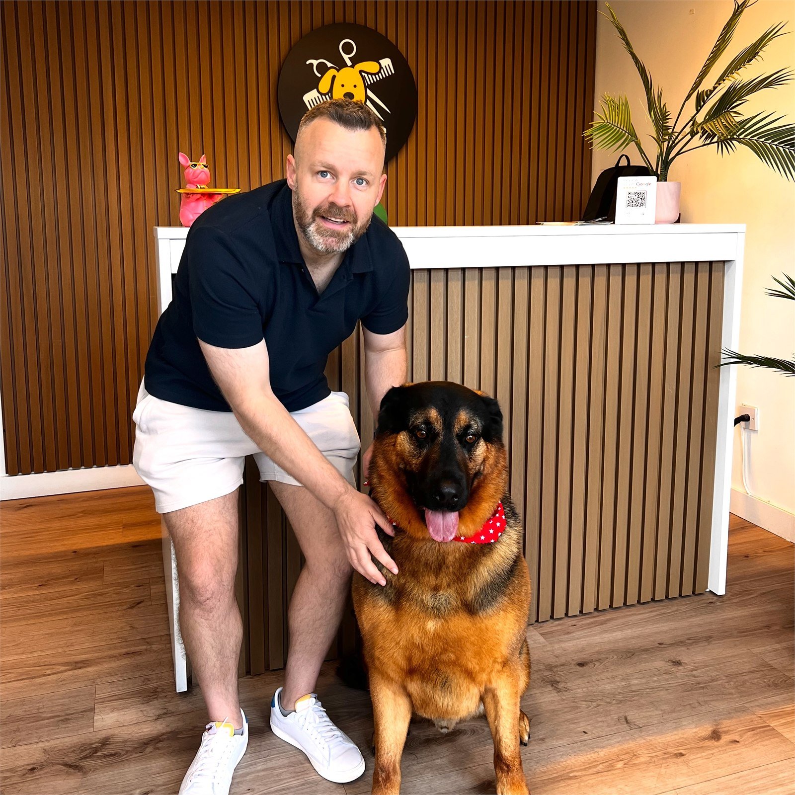 A Zoomies trainer with a dog at the Kilmacud salon